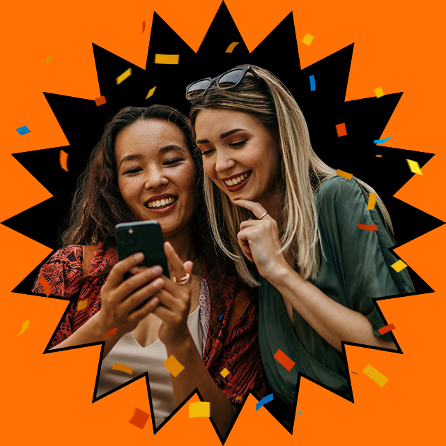 two girls looking at phone